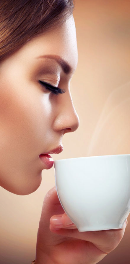 A woman drinking tea